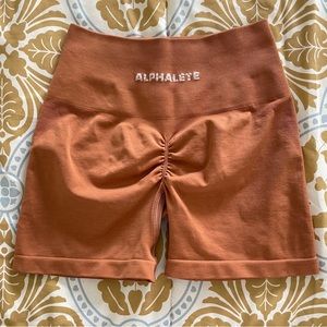 Alphalete Amplify Short in Mandarin (XS)